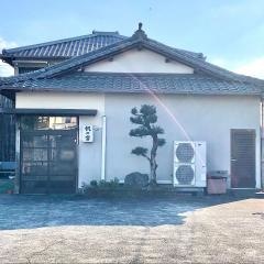 帆の字