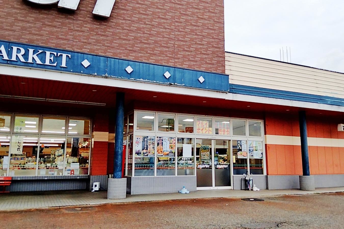 スーパーマルイ新組店の入り口