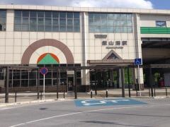 飯山満駅