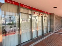 岡三証券株式会社　千里支店