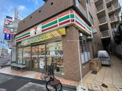 セブンイレブン　摂津千里丘2丁目店磯の屋