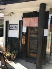 満麺の笑み