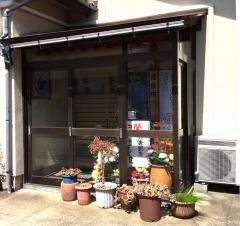 まる金